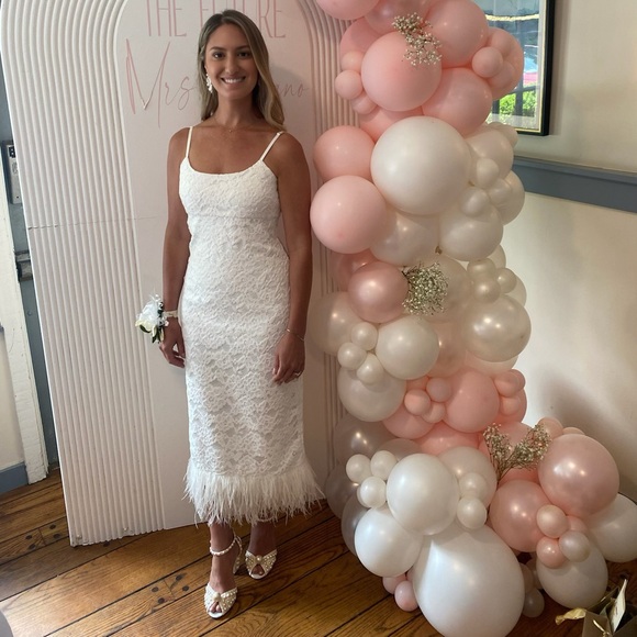 Bought for bridal shower. The lace with the feathers is elegant yet so fun! - Picture 8 of 11